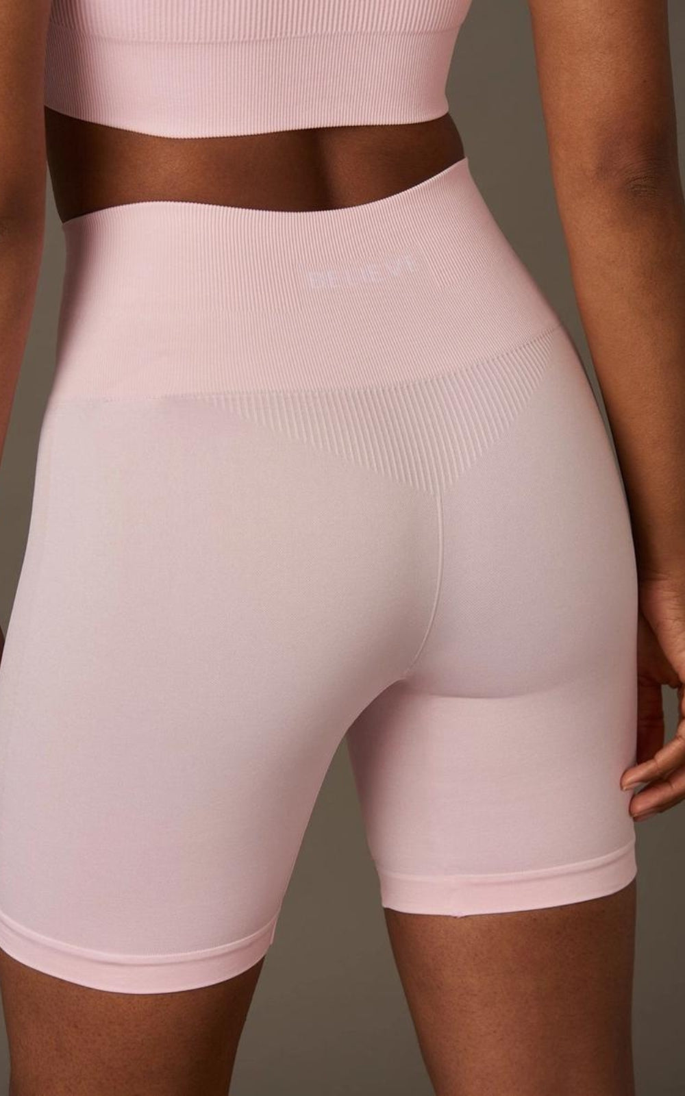 Seamless Comfort with Our Ice Pink High-Waisted Push-Up Shorts